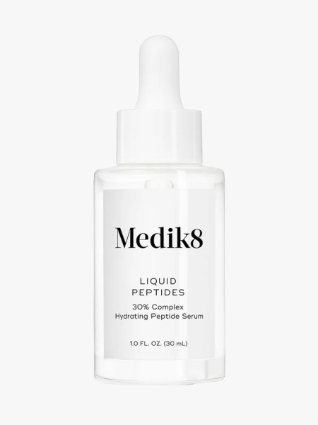 Medik8 Liquid Peptides Serum clear serum bottle with white dropper cap on light gray background